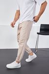  Erkek Bej Baggy Fit Parçalı Diz Ve Paçası Lastikli Pantolon 