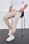  Erkek Bej Baggy Fit Parçalı Diz Ve Paçası Lastikli Pantolon 